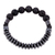 Hematite and vulcanite beaded stretch bracelet, 'Night Worlds' - Black Hematite and Vulcanite Beaded Stretch Bracelet