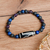 Stretch-Armband mit Perlen aus mehreren Edelsteinen - Armband mit Dzi-Anhänger und Perlen aus mehreren Edelsteinen in Blau