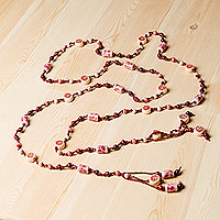 Ceramic station beaded necklace, 'Red Dances' - Floral Red Ceramic Station Beaded Necklace with Tassel