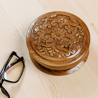 Wood jewelry box, 'Arcadia's Vision' - Hand-Carved Round Walnut Wood Jewelry Box with Floral Motifs