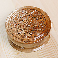 Wood jewelry box, 'In Paradise' - Traditional Hand-Carved Floral Round Walnut Wood Jewelry Box