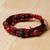 Jasper and vulcanite beaded macrame bracelet, 'Red Calls' - Adjustable Red and Black Macrame Bracelet with Jasper Gems