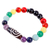 Multi-gemstone beaded stretch bracelet, 'Rainbow Dzi' - Spiral Dzi Multi-Gemstone Beaded Stretch Pendant Bracelet