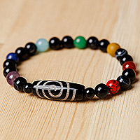 Multi-gemstone beaded stretch bracelet, 'Harmonious Dzi' - Colorful Spiral Dzi Multi-Gemstone Beaded Pendant Bracelet