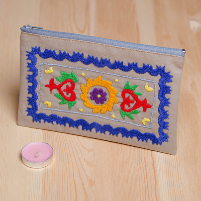 Hand-embroidered suzani cotton cosmetic bag, 'Chic Flair' - Cotton Cosmetic Bag with Suzani Hand-Embroidered Motifs