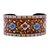Lacquered tin cuff bracelet, 'Goddess of Mountains' - Floral Adjustable Golden, Blue and Brown Tin Cuff Bracelet