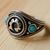 Men's sterling silver cocktail ring, 'Emblem of Peace' - Men's Traditional Reconstituted Turquoise Cocktail Ring