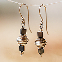 Hematite dangle earrings, 'Spiral of Protection' - Spiral Sterling Silver and Natural Hematite Dangle Earrings