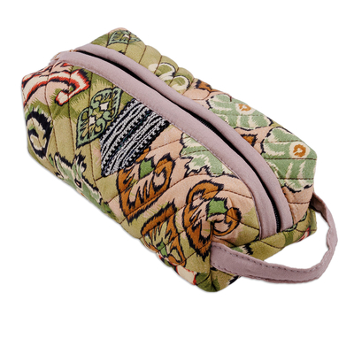 Ikat cotton cosmetic bag, 'Garden Glam' - Handmade Ikat Cotton Floral & Leaf Cosmetic Bag with Handle