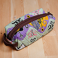 Ikat cotton cosmetic bag, 'Dreamy Designs' - Handmade Cotton Cosmetic Bag with Handle and Ikat Patterns