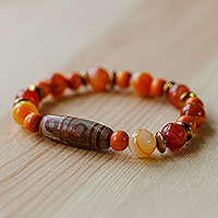 Multi-gemstone and wood beaded stretch pendant bracelet, 'Lively Dzi' - Orange Dzi Multi-Gemstone and Wood Beaded Stretch Bracelet