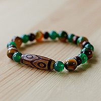 Multi-gemstone and wood beaded stretch pendant bracelet, 'Green Dzi' - Green Dzi Multi-Gemstone Wood Bead Stretch Pendant Bracelet