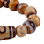 Multi-gemstone and wood beaded stretch pendant bracelet, 'Brown Dzi' - Multi-Gemstone Wood Beaded Stretch Bracelet with Dzi Pendant