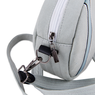 Tarp sling bag, 'Cycle of Style' - Handcrafted Adjustable Round Blue and Grey Sling Bag