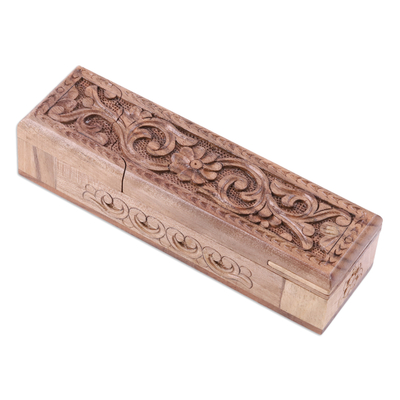 Wood puzzle box, 'Khiva's Enigma' - Folk Art Floral Walnut Wood Puzzle Box from Uzbekistan