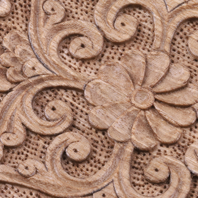 Wood magnet, 'The Floral Eden' - Hand-Carved Floral Round Walnut Wood Magnet from Uzbekistan