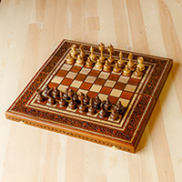 Wood chess and backgammon set, 'Triumph' - Classic Hand-Carved Walnut Wood Chess and Backgammon Set
