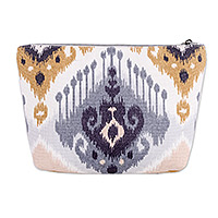 Cotton blend ikat cosmetic bag, 'Classic Grace' - Ikat-Patterned Blue and Yellow Cotton Blend Cosmetic Bag