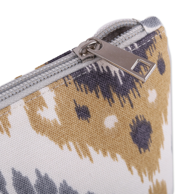 Cotton blend ikat cosmetic bag, 'Classic Grace' - Ikat-Patterned Blue and Yellow Cotton Blend Cosmetic Bag