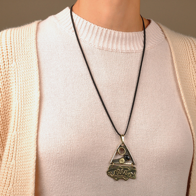 Onyx pendant necklace, 'Fish Life' - Fish-Themed Brass and Melchior Pendant Necklace with Onyx