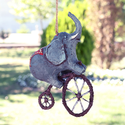 Papier mache ornament, 'Giant's Spectacle' - Hand-Painted Papier Mache Ornament of Elephant on a Bike