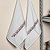 Cotton tea towels, 'Burgundy Saga' (pair) - Arrow-Themed Burgundy and Beige Cotton Tea Towels (Pair)