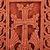 Tuff stone stela sculpture, 'Red Faith Flower' - Hand-Carved Traditional Floral Tuff Stone Stela Sculpture