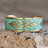 Brass cuff bracelet, 'Green Rhombus Fantasy' - Oxidized Brass Cuff Bracelet with Traditional Armenian Motif