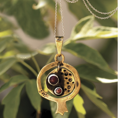 Carnelian pendant necklace, 'Nur Amulet' - Carnelian Brass Nur Amulet Pendant Necklace