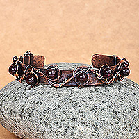 Copper and obsidian cuff bracelet, 'Purity Fruits' - Antiqued Finished Copper Cuff Bracelet with Obsidian Jewels