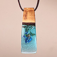 Natural flower pendant necklace, 'Spring Blue' - Blue-Toned Natural Flower and Apricot Wood Pendant Necklace