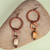 Onyx and copper dangle earrings, 'Dancing Hoops' - Antique Linked Hoop Copper Dangle Earrings with Onyx Stones