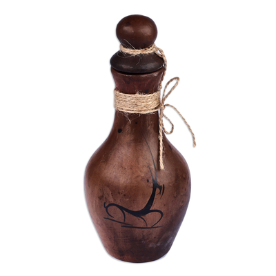 Botella decorativa de terracota. - Botella decorativa de terracota hecha a mano con detalles en cuerda de yute
