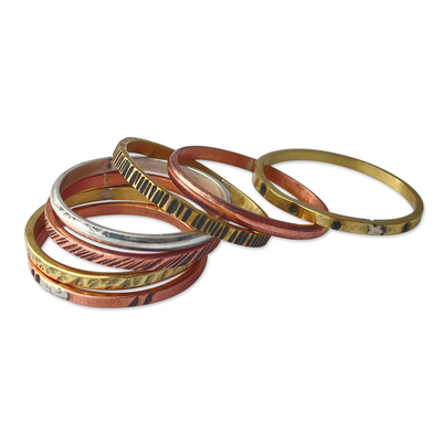 Copper and brass band rings, 'Earth's Triumph' (set of 7) - Set of 7 Copper and Brass Band Rings in a Polished Finish