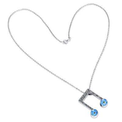 Natural flower and sterling silver pendant necklace, 'Rhythm & Memories' - Beam Note-Shaped Blue Natural Flower Pendant Necklace