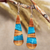 Wood and resin dangle earrings, 'Oceanic Dimension' - Drop-Shaped Apricot Wood Blue Resin Dangle Earrings