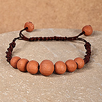 Terracotta beaded macrame pendant bracelet, 'Natural Spell' - Terracotta Beaded Macrame Pendant Bracelet from Armenia