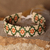 Glass beaded wristband bracelet, 'Spring Luck' - Traditional Floral Green Glass Beaded Wristband Bracelet