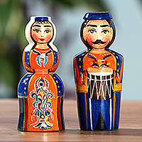 Wood figurines, 'Taraz Bond' (set of 2) - 2-Piece Blue and Orange Taraz Couple with Drum Figurine Set