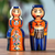 Wood figurines, 'Taraz Bond' (set of 2) - 2-Piece Blue and Orange Taraz Couple with Drum Figurine Set