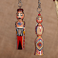 Wood keychains, 'Romantic Taraz' (set of 2) - 2-Piece Red and Beige Taraz Couple Beechwood Keychain Set