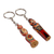 Wood keychains, 'Romantic Taraz' (set of 2) - 2-Piece Red and Beige Taraz Couple Beechwood Keychain Set