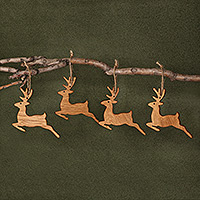 Wood ornaments, 'Reindeer Fest' (set of 4) - Armenian-Made 4-Piece Deer-Shaped Beech Wood Ornament Set