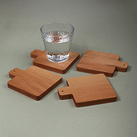 Wood coasters, 'Cheeseboard Drinks' (set of 4) - Hand-Carved Cheeseboard-Themed 4-Piece Wood Coaster Set