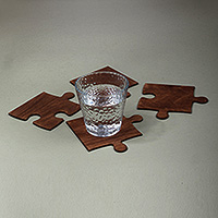 Wood coasters, 'Puzzled Elixir' (set of 4) - Artisan-Made Set of 4 Puzzle-Themed Dark Brown Wood Coasters