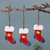 Ceramic ornaments, 'Starry Gifts' (set of 3) - Star-Themed 3-Piece Ceramic Christmas Stocking Ornament Set