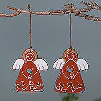 Ceramic ornaments, 'Celestial Evening' (pair) - Artisan-Crafted Angel-Themed Ceramic Ornament Pair in Brown