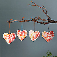 Ceramic ornaments, 'Blazing Love' (set of 4) - Abstract-Patterned Heart-Shaped 4-Piece Ceramic Ornament Set