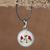 Natural flower pendant necklace, 'Memory of Spring' - Spring-Themed Resin-Coated Natural Flower Pendant Necklace