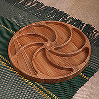 Wood appetizer plate, 'Tasty Whirl' - Armenian-Made Hand-Carved Round Beech Wood Appetizer Plate